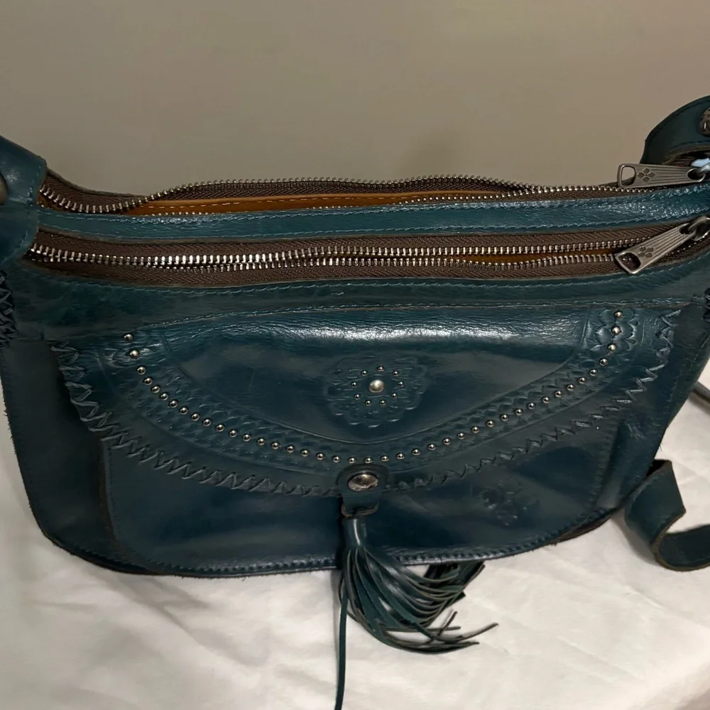 Patricia Nash Blue Shoulder Bag with Embossed Design and Tassel - Picture 2 of 12